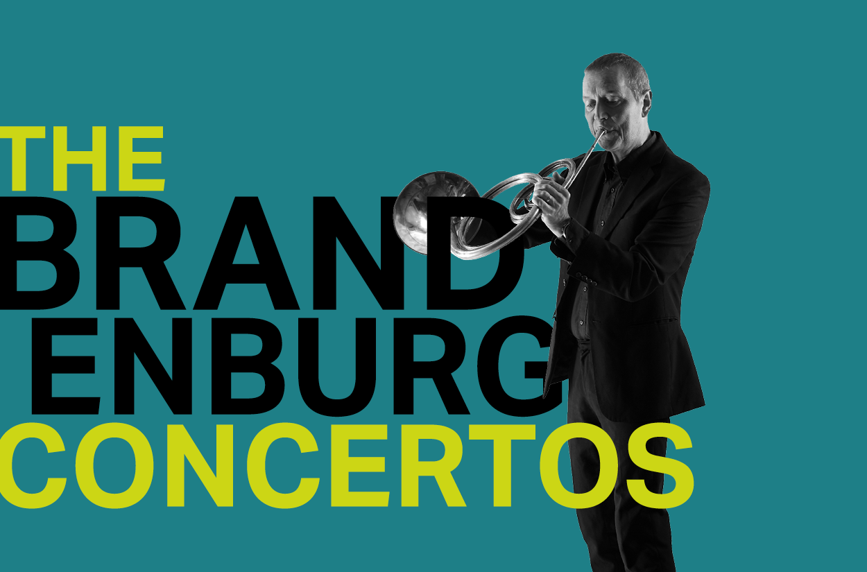 A man playing a period horn with the bell linked through the 'D' of the words THE BRANDENBURG CONCERTOS